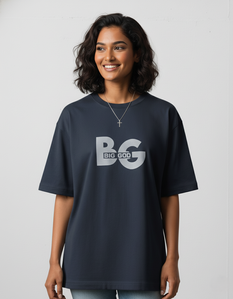 Person wearing a navy blue t-shirt with 'BIG GOD' text on a light gray background