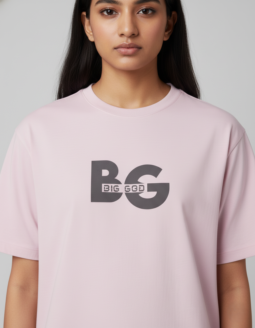 Person wearing a Light Baby Pink t-shirt with 'BIG GOD' logo on a plain background