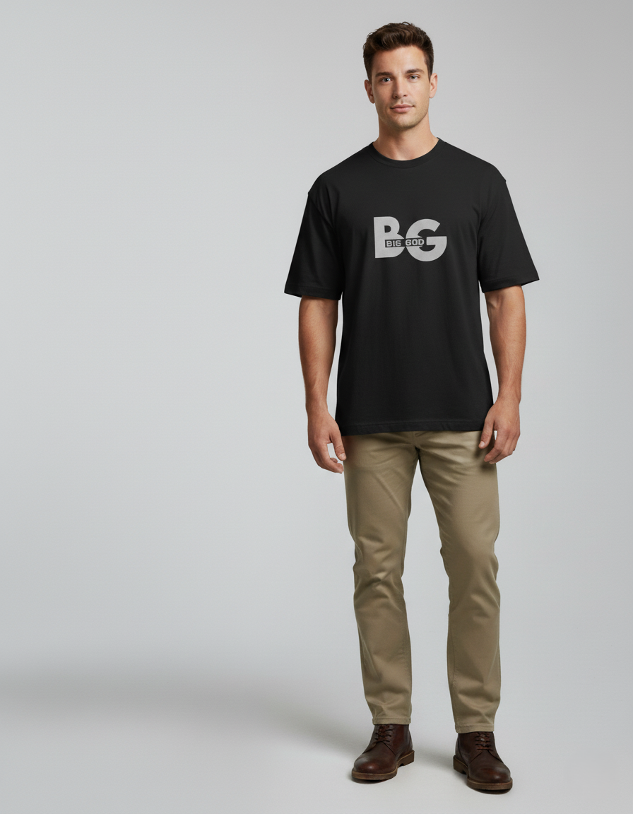 Man wearing a black t-shirt with 'BG' logo on a plain background