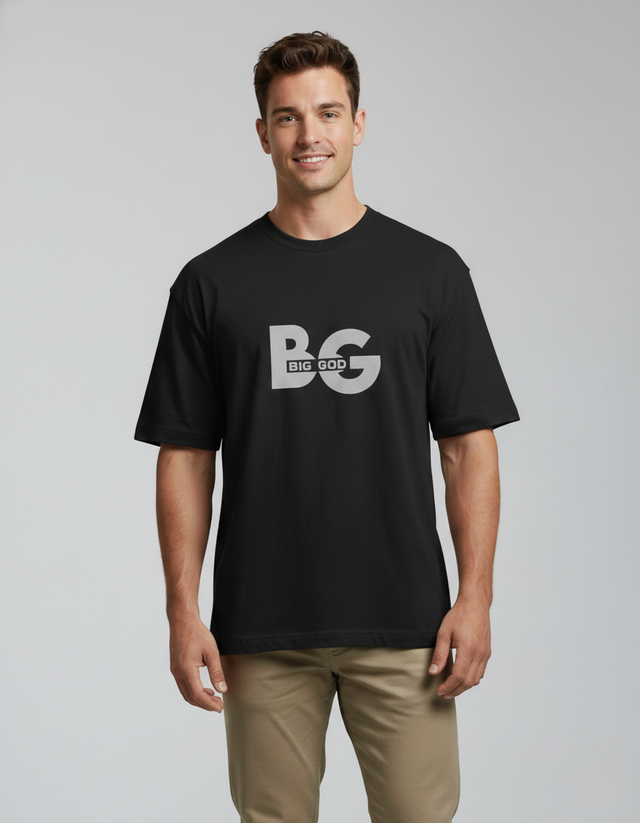 Man wearing a black t-shirt with a logo on a gray background