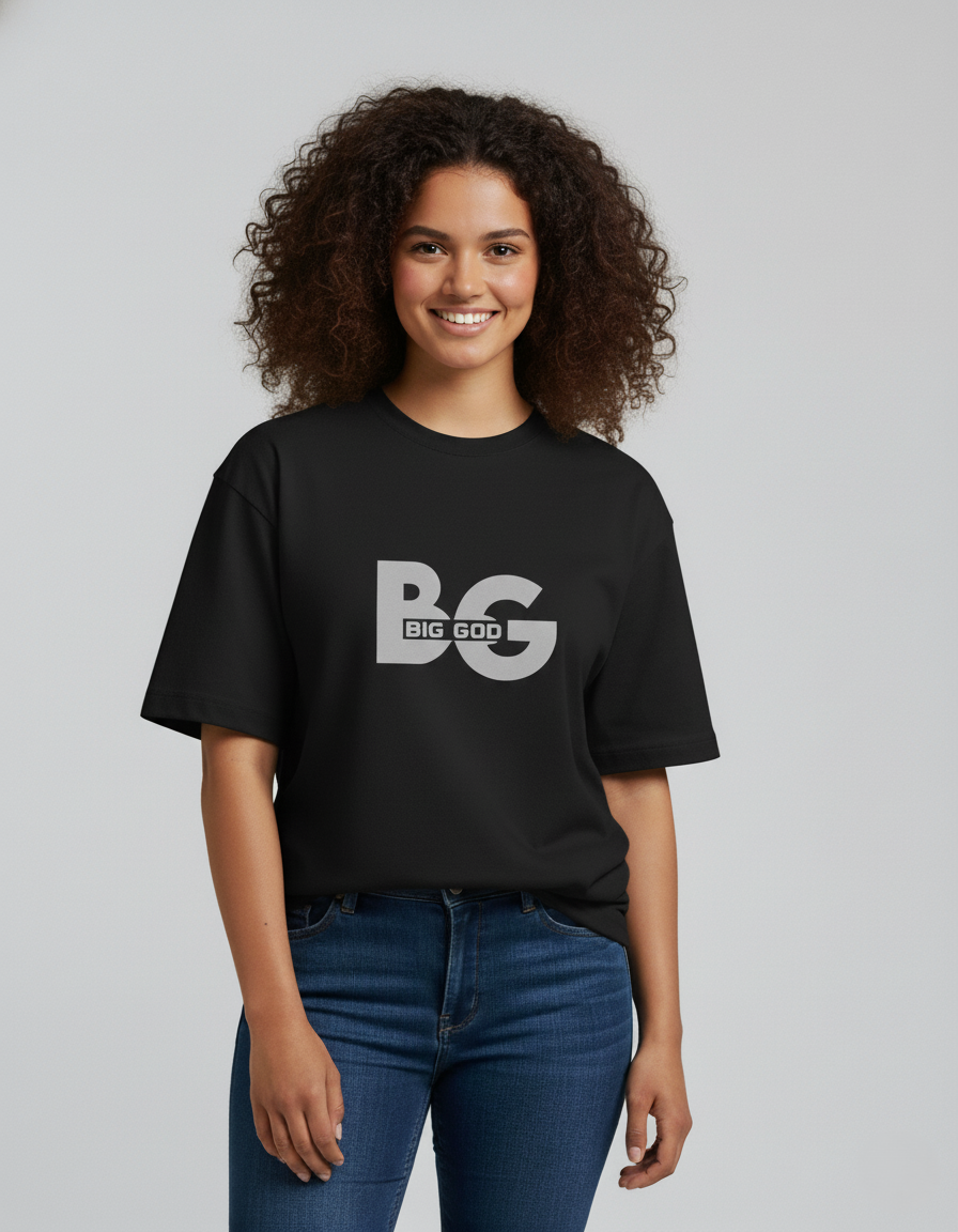 Person wearing a black t-shirt with 'BIG GOD' logo on a plain background
