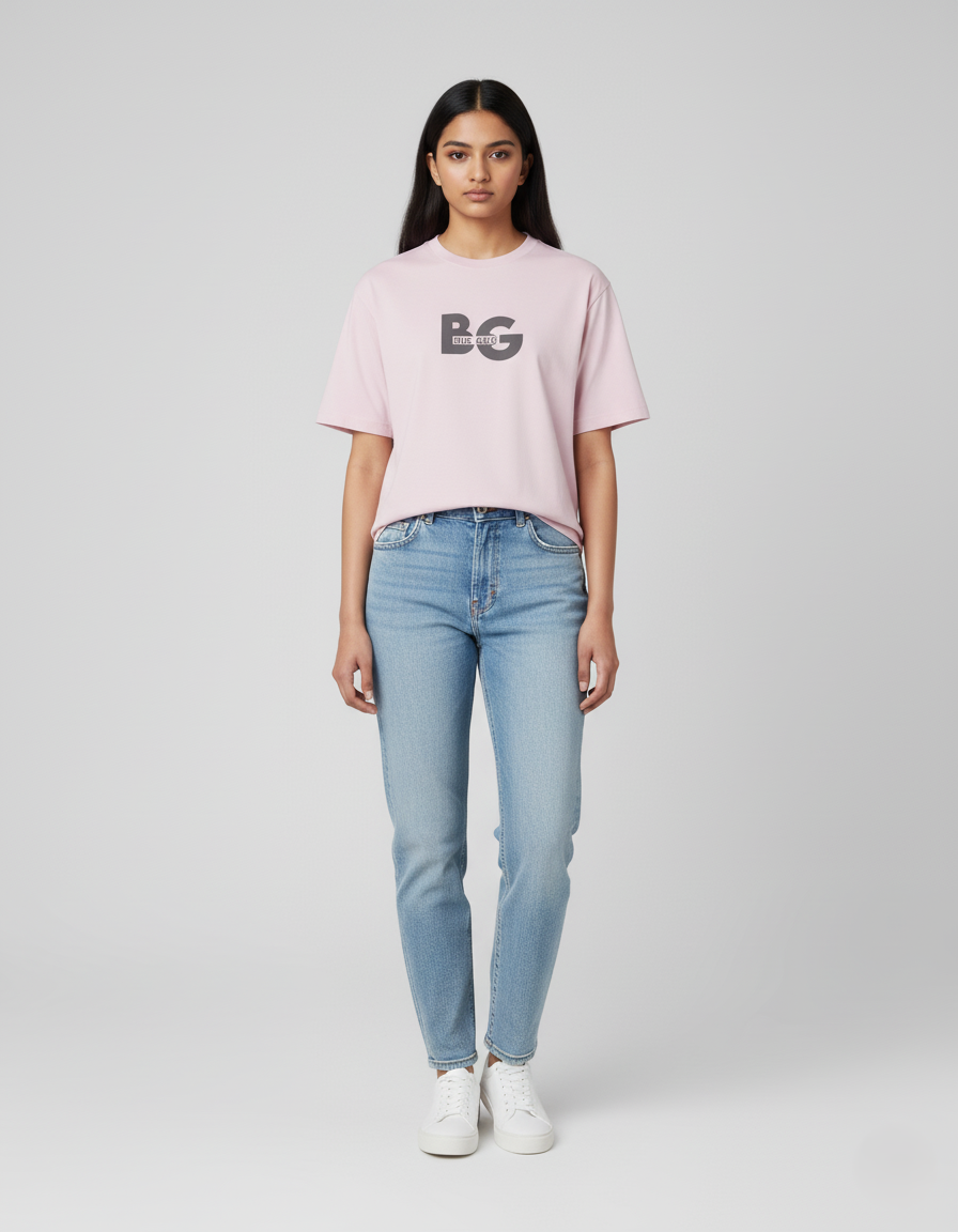 Person wearing a Light Baby Pink t-shirt with 'BG' logo