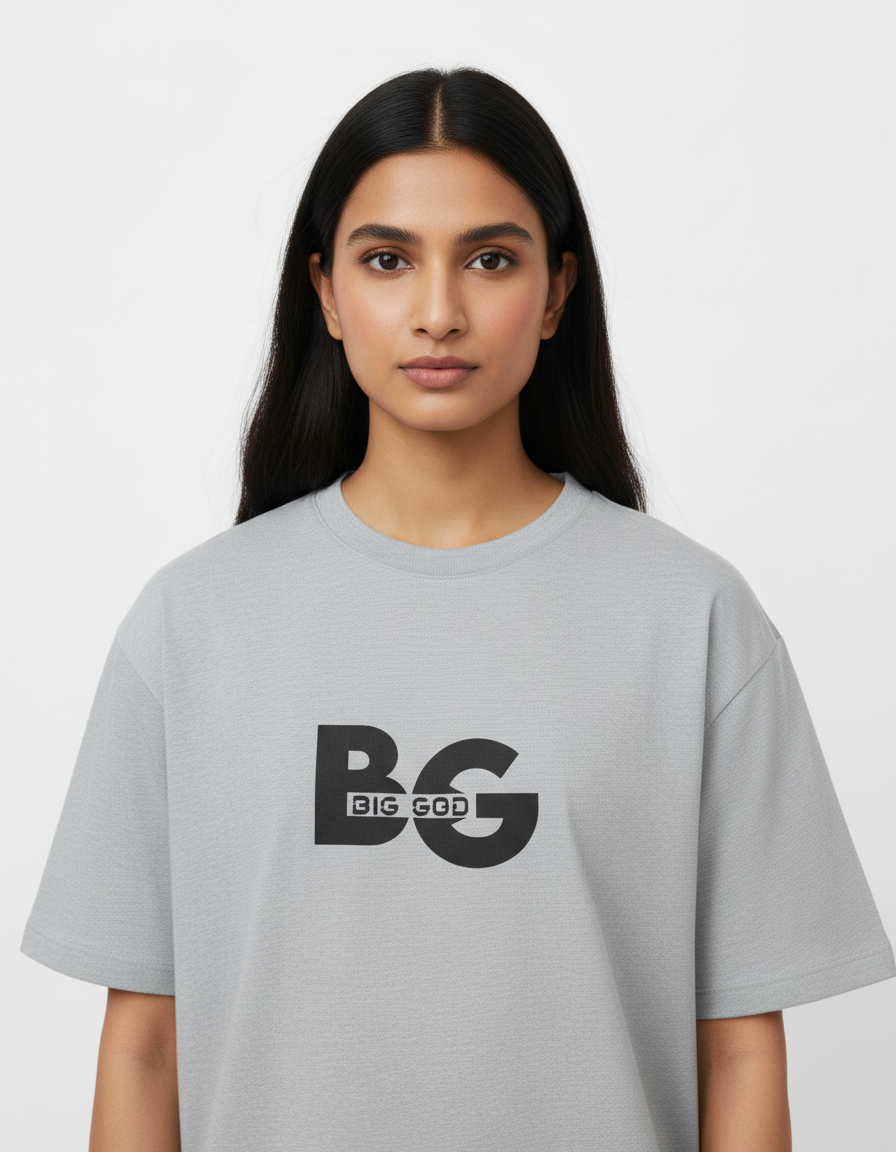 Person wearing a Grey Melange t-shirt with 'BIG GOD' logo