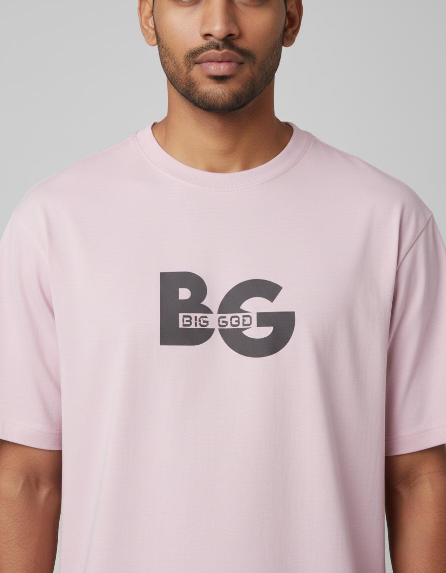 Person wearing a Light Baby Pink t-shirt with 'BIG GOD' logo on a plain background